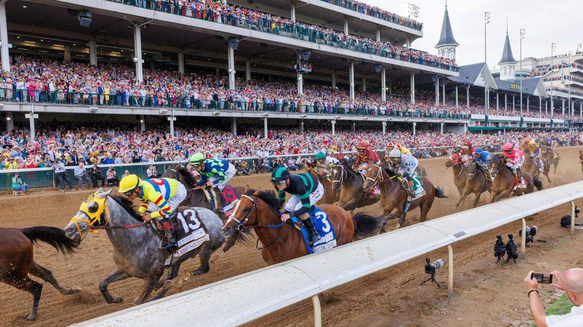 Kentucky Derby 150 won by Mystik Dan with Brian Hernandez, Jr. up (3) trained by Kenneth McPeek, Saturday, May 04, 2024 at Churchill Downs in Louisville. Brian Hernandez passes the finish line in the middle of the pack the first time by the finish line.
