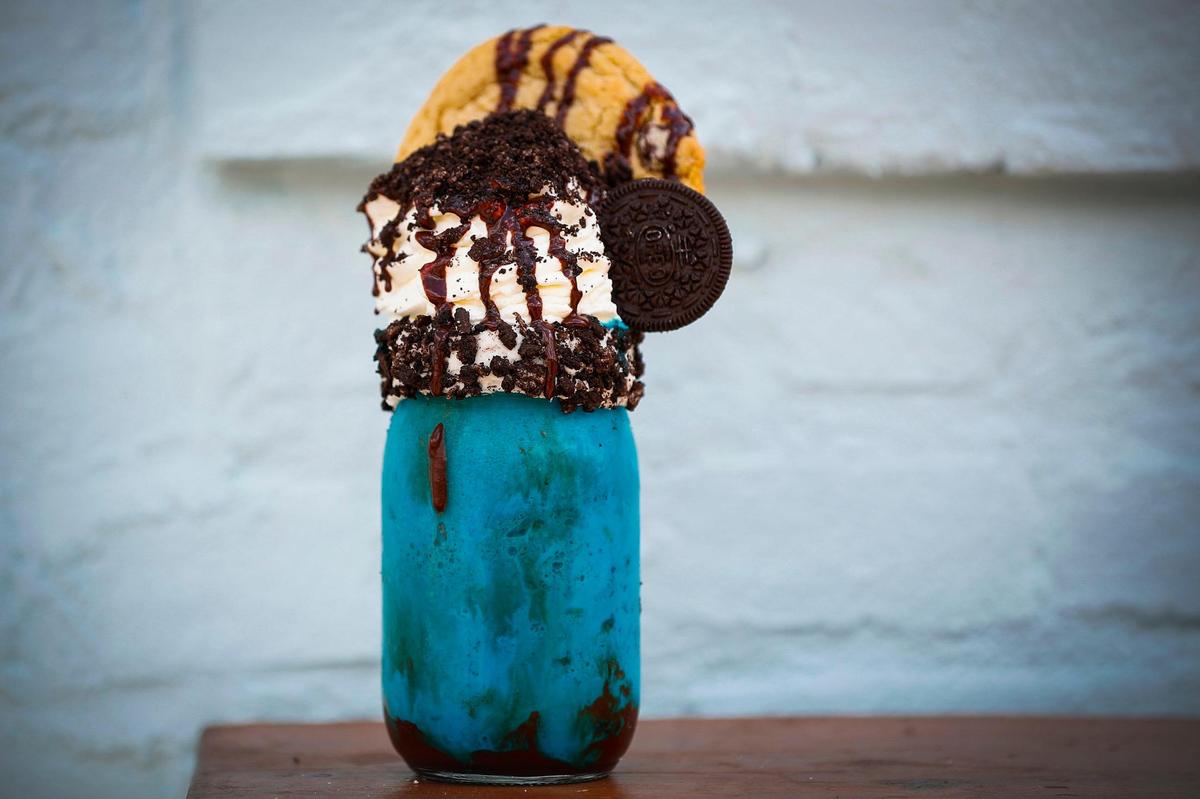 The Blue Monster Cattywampus Milkshake made with Blue Bell Blue Monster ice cream, chocolate drizzle, whipped cream, a double chocolate chunk cookie, Oreo crumbles and topped with an Oreo cookie. It’s one of the options at Georgetown’s Sweet Matriarch Bakery, which makes 100 to 225 shakes a day, all walk-up ordering, no pre-ordering.