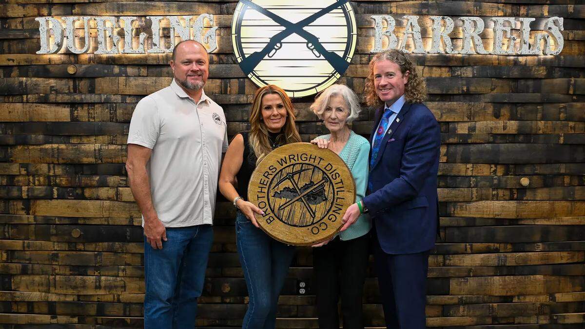 Lyons Brewing & Distilling has transferred ownership of Dueling Barrels Brewery & Distillery in Pikeville to Brothers Wright Distilling Co., a local, family-owned business known for aging its bourbon in a former coal mine. Brothers Wright will continue to produce moonshine and sell Dueling Barrels’ Pikeville Ale and Coal Porter beverages. The company plans to grow the distillery’s footprint and use the 30,000-square-foot facility in downtown Pikeville as a central hub for hospitality and community engagement. Shannon Wright, president, CEO and co-founder of Brothers Wright and his wife, Kandi Wright are shown here with and Mrs. Deirdre Lyons and Mark Lyons of Lyons Brewing & Distilling Co.