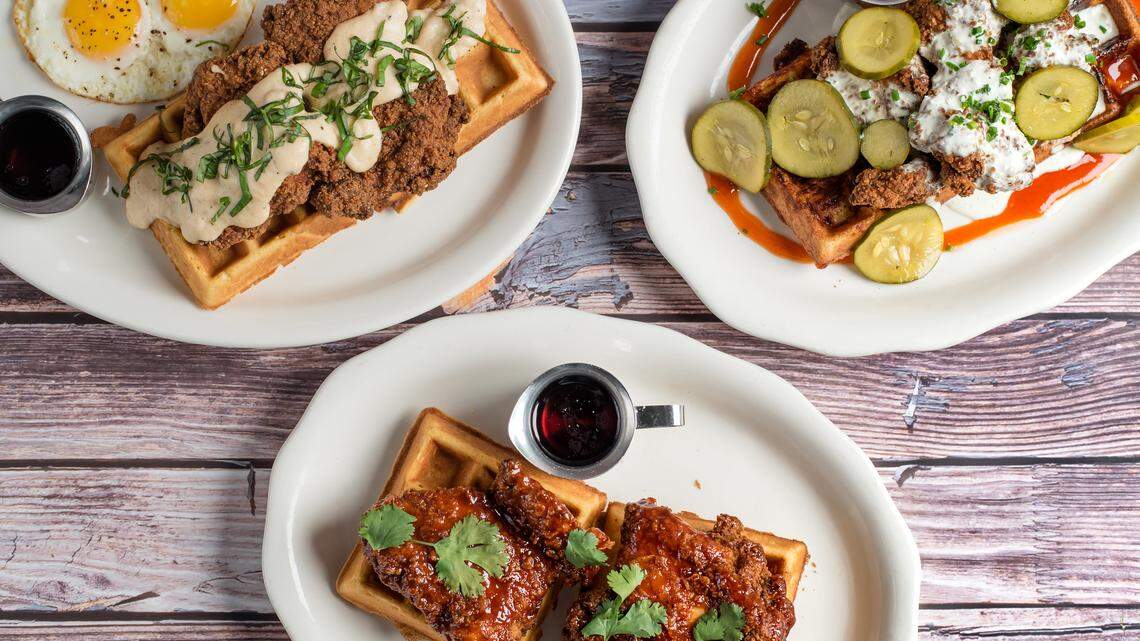 Tupelo Honey has three versions of chicken and waffles: Country Style, from left, Sriracha Honey and Mac-n-Cheese with Asheville Hot Fried Chicken.