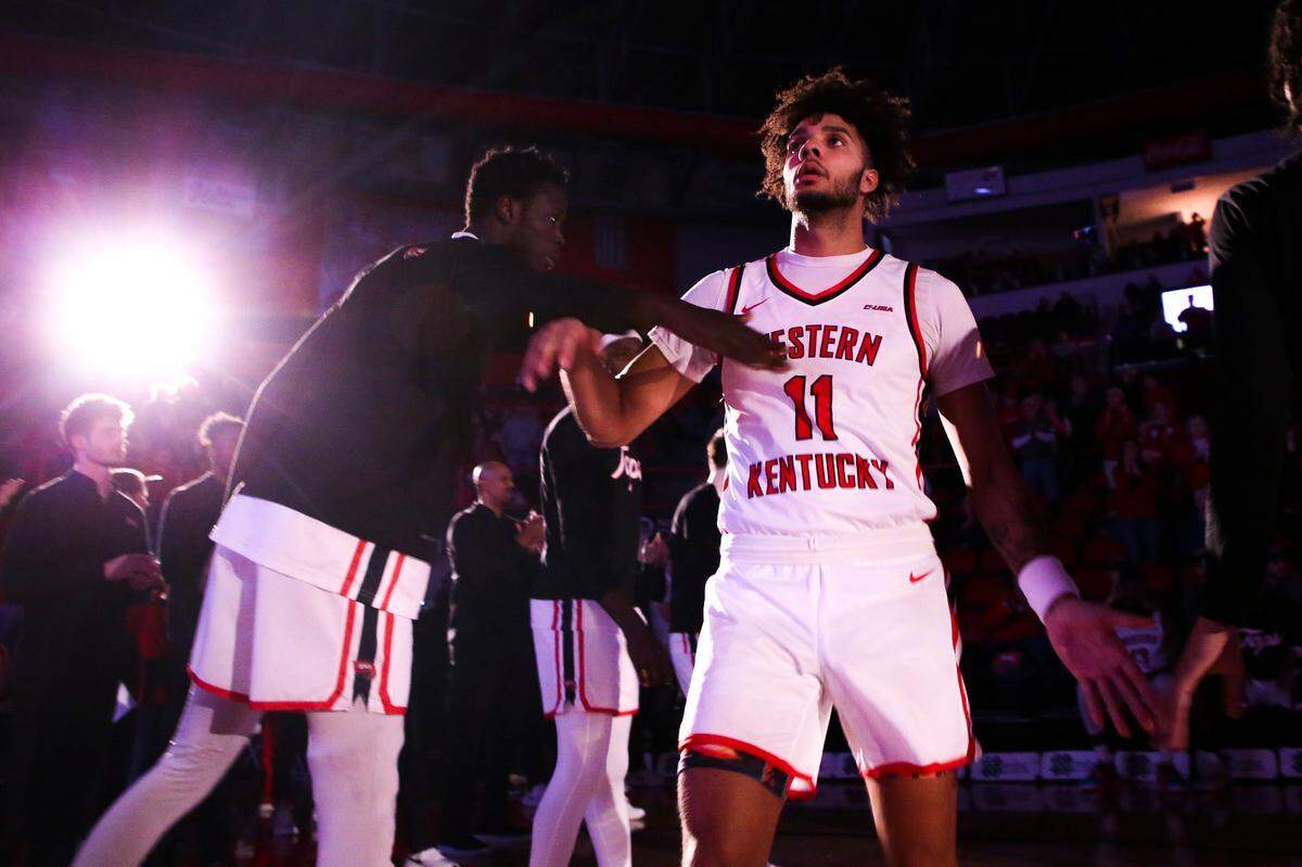 New WKU men’s basketball coach Steve Lutz has high hopes for ex-Kentucky Wildcats guard and former Pendleton County High School star Dontaie Allen (11). “I really like him,” Lutz says of Allen. “He works hard. He’s very coachable. And, obviously, he can really put the ball in the basket.”