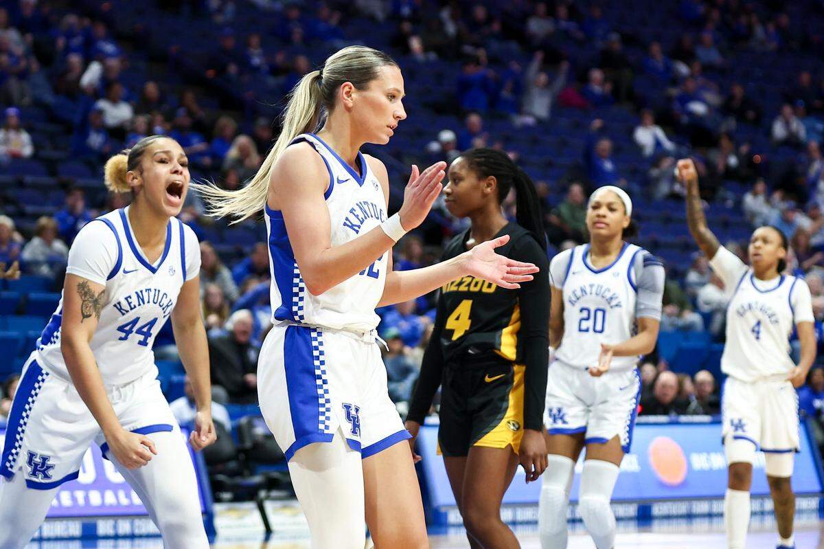 Kentucky guard Maddie Scherr celebrates scoring and drawing a foul against Missouri. She had 19 points, nine rebounds, six assists, two steals and two blocks in the Wildcats’ win.