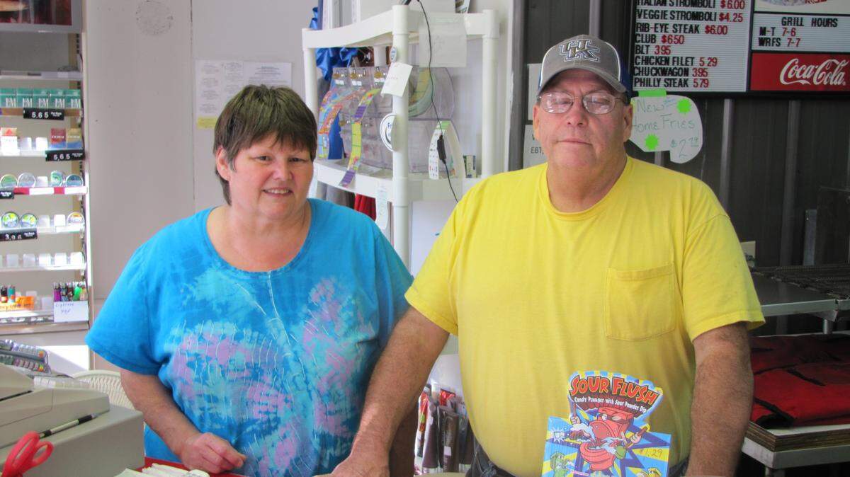 Sharon Lewis, left, and her husband Terry, a former coal miner who got hurt in a roof fall, are helping run a small market at Lynch that just opened four month ago. Terry Lewis said business dropped after coal layoffs in the area.