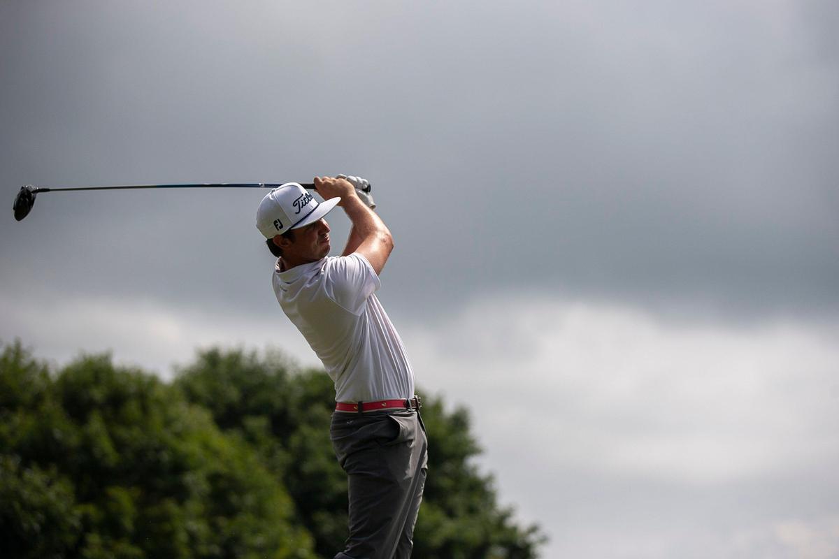 J.T. Poston tees off during PGA Barbasol Championship on Thursday. Poston shot a 10-under-par 62 to secure the first-round lead.