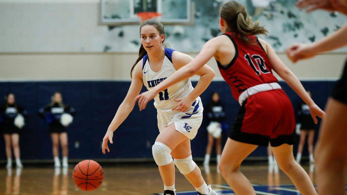 Lexington Catholic freshman Abby Hammond, shown here during a regular-season game against Paul Laurence Dunbar, made four three-point baskets on her way to 17 points in the Knights’ district semifinals victory over the Bulldogs on Tuesday night. Hammond totaled just seven points during LexCath’s two regular-season wins over Dunbar.