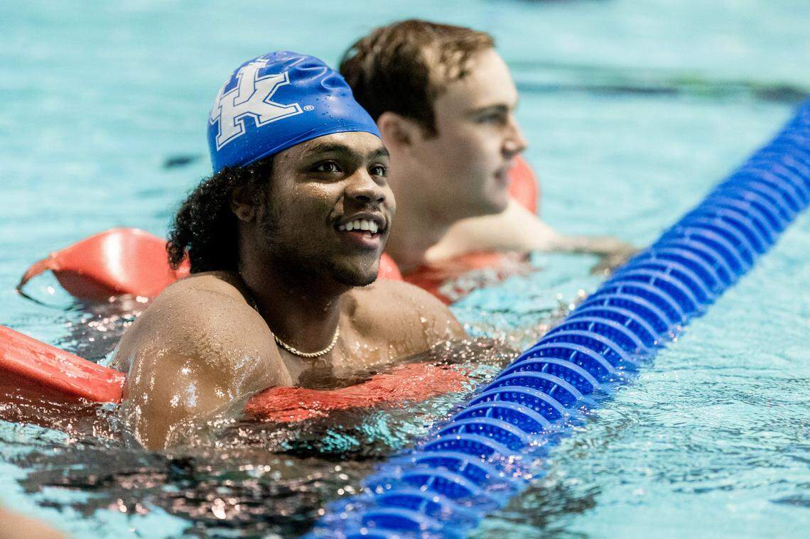 Kentucky point guard Sahvir Wheeler smiles in the pool during the swimming lessons for UK basketball players.