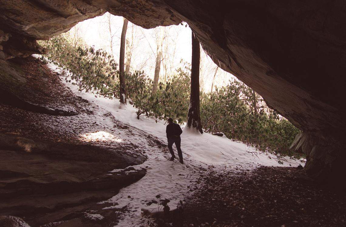 A hiker stopped in a rock shelter just off a trail on Pine Mountain from Breaks Interstate Park to U.S. 23, in Jenkins.