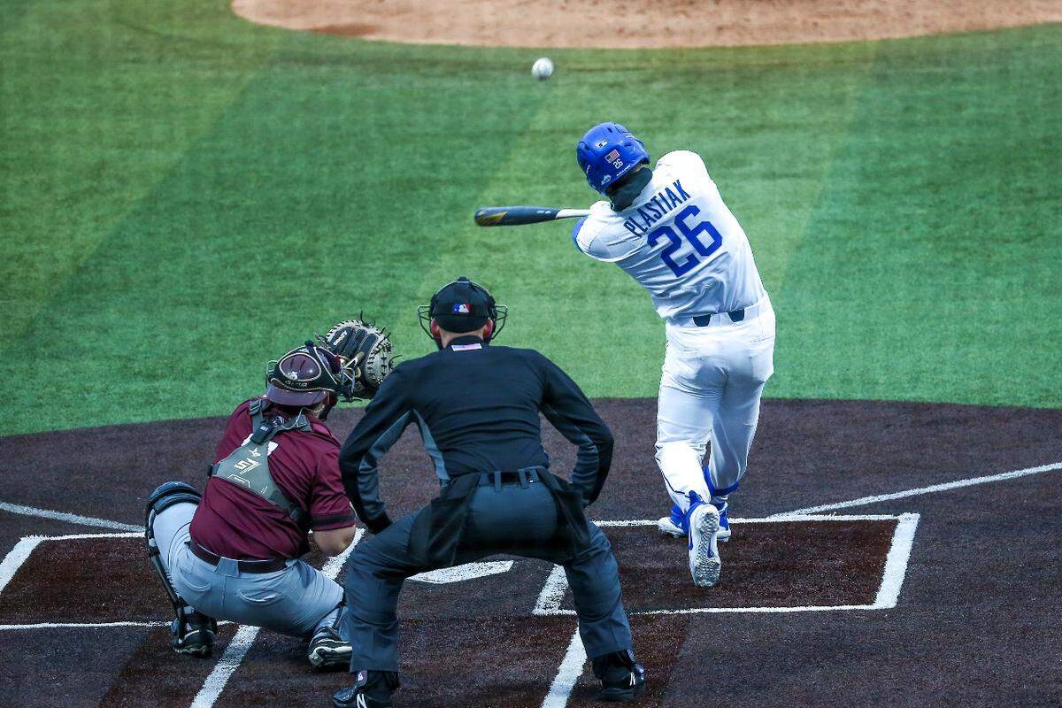 Kentucky baseball senior first baseman Jacob Plastiak hits a game-tying home run to right field during UK’s home opener for the 2022 season on Wednesday afternoon against Bellarmine at Kentucky Proud Park. The Cats are now 4-0 after a walk-off win over Bellarmine.