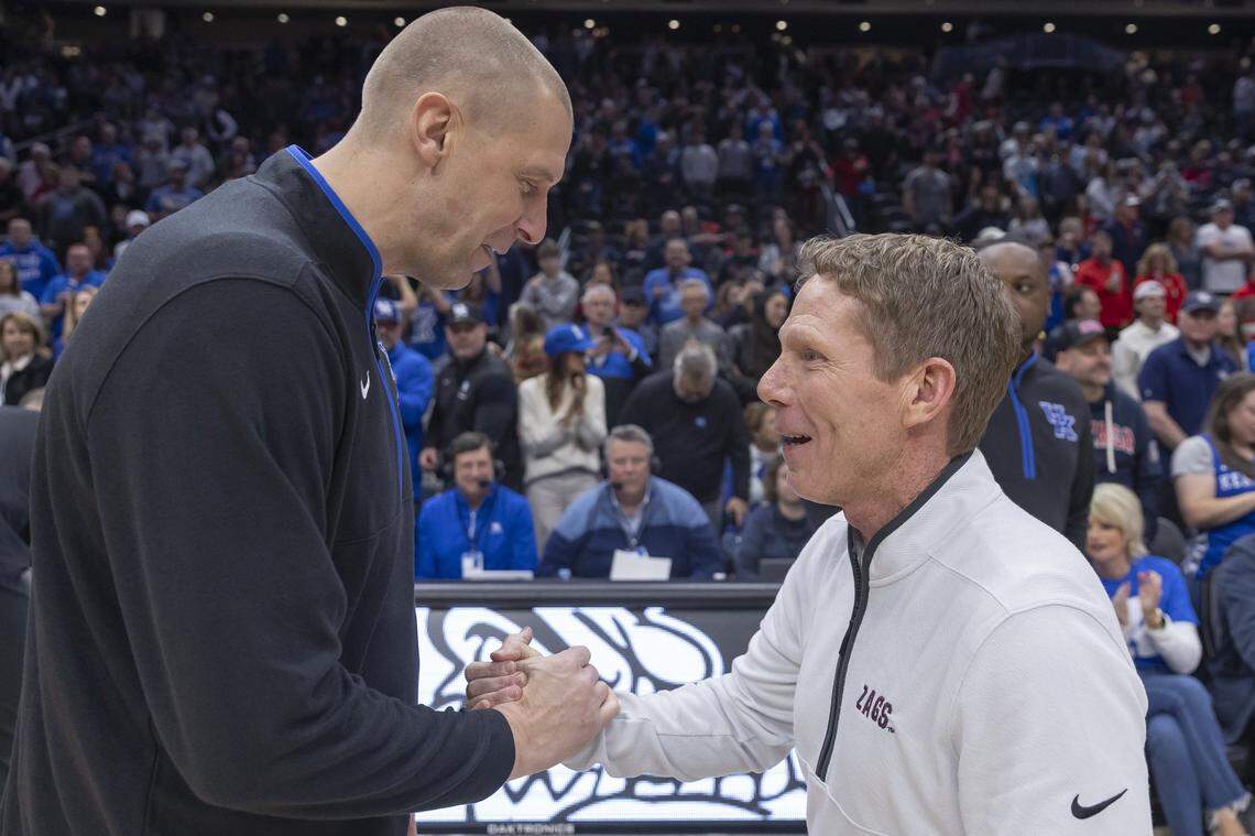 Still seeking its first win over a ranked opponent after three defeats, No. 18 Kentucky and coach Mark Pope, left, will face No. 11 Gonzaga and coach Mark Few on Friday in Nashville.