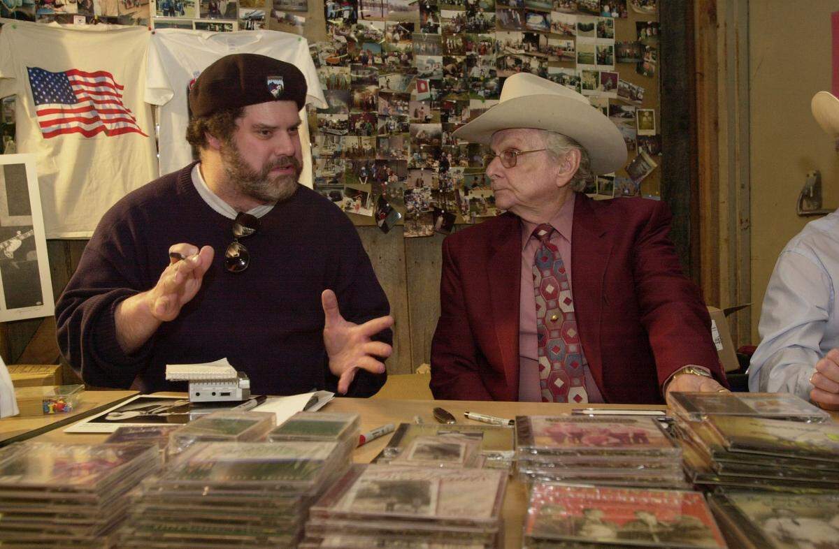 Walter Tunis interviewing Ralph Stanley at Meadowgreen Park Music Hall in the late 1990s, for a feature Tunis did on Meadowgreen Park.