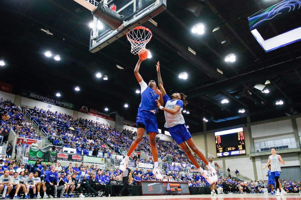 Kentucky’s Ugonna Onyenso (33) drives to the basket during Saturday night’s Blue-White Game, which attracted more than 7,000 fans to Appalachian Wireless Arena in Pikeville.