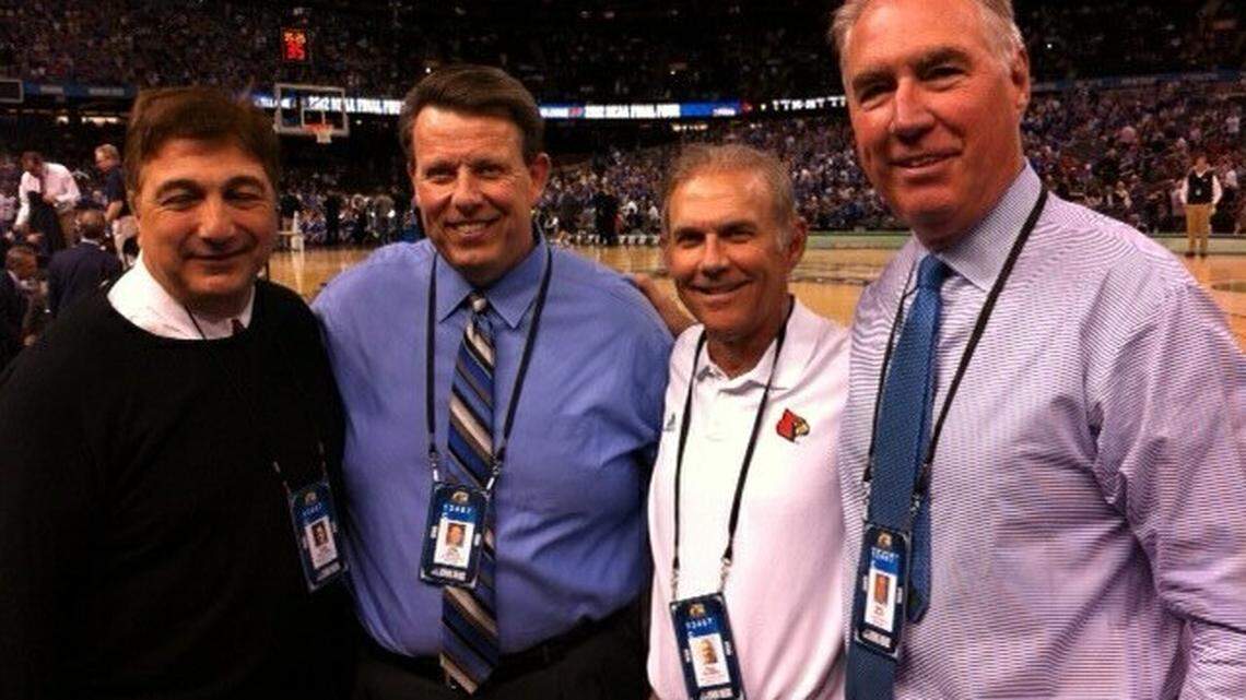 University of Louisville color analyst Bob Valvano, University of Kentucky play-by-play voice Tom Leach, U of L play-by-play man Paul Rogers and UK color analyst Mike Pratt got together for a photo during the Final Four.