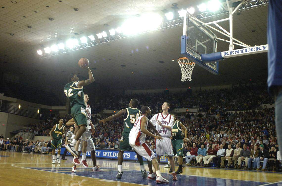 A crowd of about 7,500 watched as O.J. Mayo, left, and his team from Huntington, West Virginia, lost to Scott County in a boy's high school basketball game at Memorial Coliseum on Feb. 2, 2007.