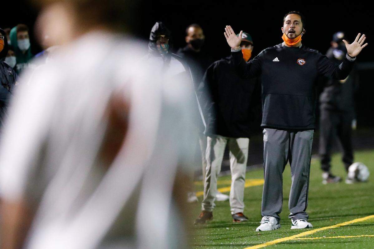 Frederick Douglass’ head coach Omar Shalash instructs the team against Henry Clay during the 42nd District championship match in 2020.