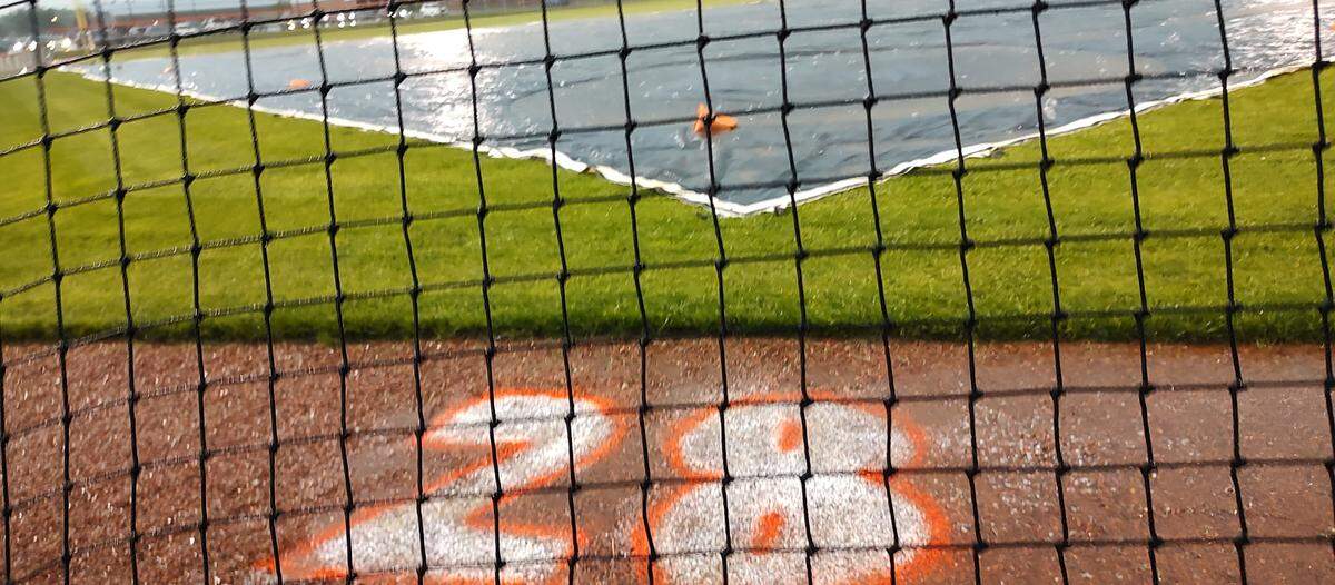 Matthew Perrine’s number, 28, was painted on the baseball field at Frederick Douglass High School in Lexington, KY, Tuesday night.