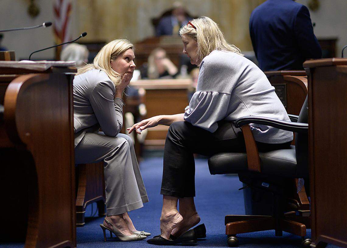 Sen. Amanda Mays Bledsoe, R-Lexington, confers with Senate Majority Caucus Chair Julie Raque Adams, R-Louisville, on the Senate floor during the 2024 General Assembly.