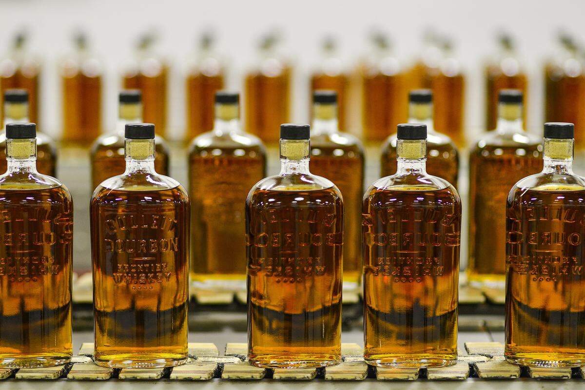 Bulleit bourbon bottles made their way down an assembly line to be sealed and labeled at Stitzel Weller in Louisville in 2015. Parent company Diageo has since opened another distillery and visitors center in Shelbyvile and broke ground on another in Lebanon.