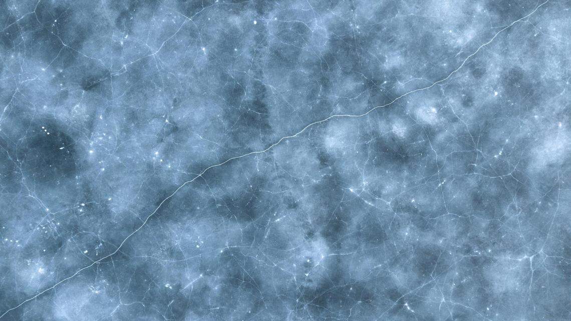 An 82-year-old man fell through Lake Champlain’s ice while driving an ATV and died, Vermont officials said.