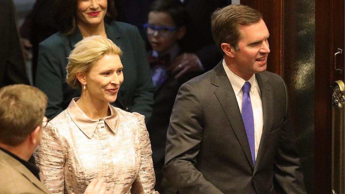 Kentucky Governor Andy Beshear and the first lady of Kentucky, Britainy Beshear, entering the Kentucky Senate floor before the governor’s joint session address at the Kentucky State Capitol in Frankfort, Ky, on January 8, 2025.