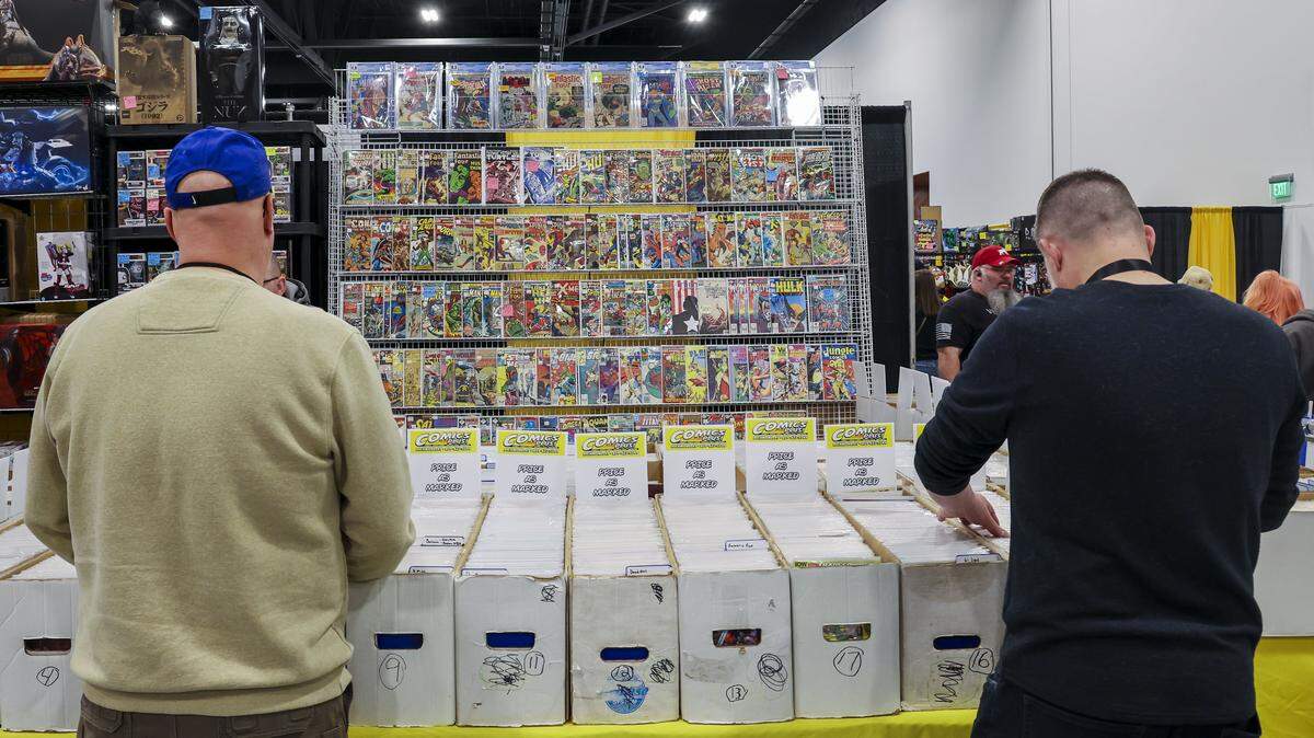 Patrons shop at comic venders on the exhibit floor during the 2025 Lexington Comic and Toy Convention at the Central Bank Center in Lexington, Ky. on Sunday, March 9, 2025.