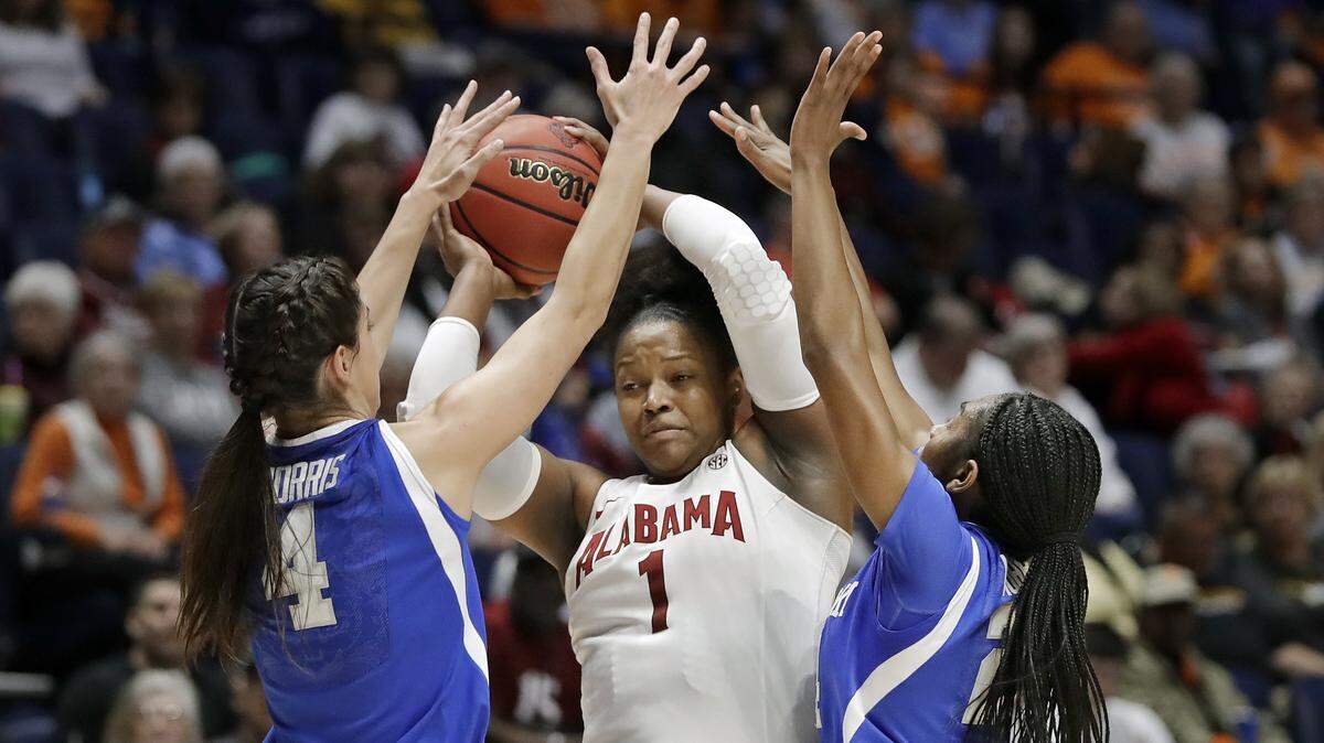 Kentucky's Maci Morris, left, and Taylor Murray trapped Alabama forward Quanetria Bolton during an SEC Tournament game in Nashville last March. Both players return for the Wildcats this season.