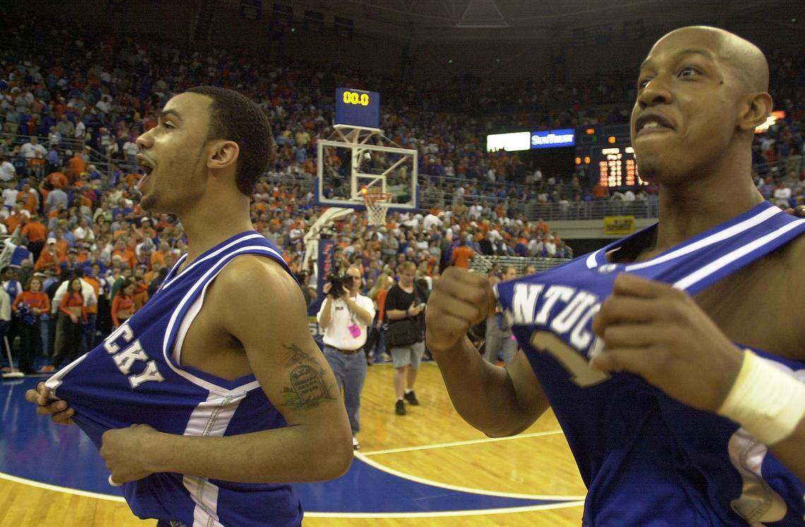 Kentucky guard Keith Bogans, right, celebrated with teammate Gerald Fitch after the Wildcats beat Florida 69-67 in Gainesville on March 8, 2003.