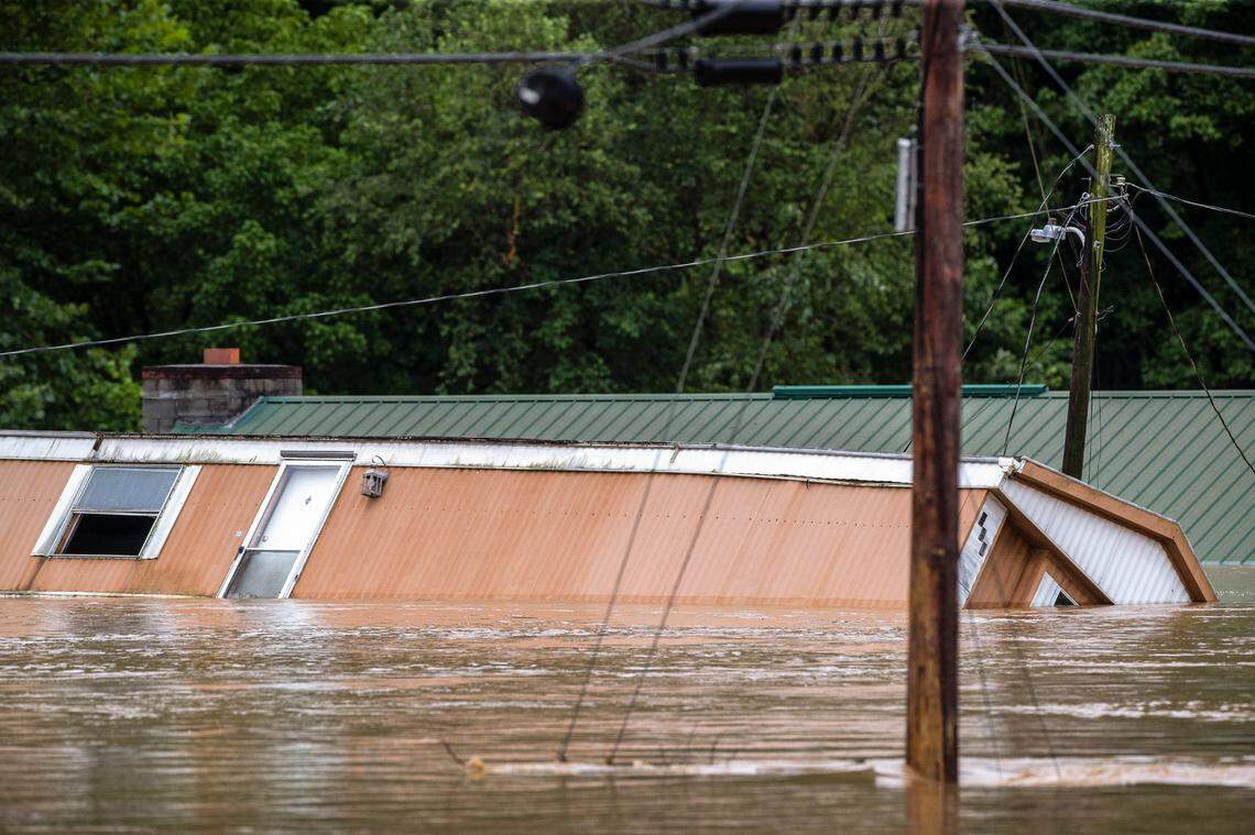 Flooded homes near Lost Creek, Ky., after significant rainfall led to flash flooding on Thursday, July 28, 2022.