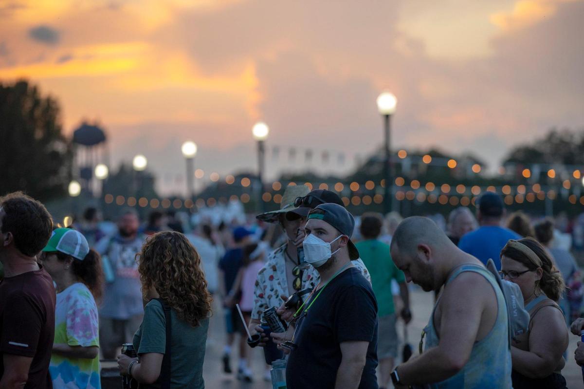 People wait in line at a beverage vendor at the Railbird Festival at Keeneland in Lexington, Ky., on Saturday, Aug. 28, 2021.