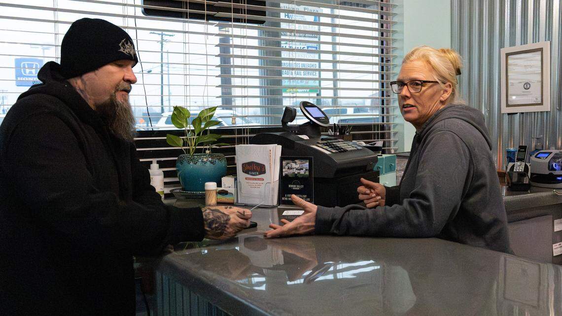 Shelby Keith, owner of Shelby's Diner, socializing with customers and having small talk on Nov. 19, 2025, in Frankfort, Ky. 