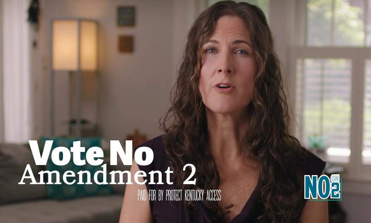 A new ad from Protect Kentucky Access, a campaign trying to defeat a constitutional amendment on the November ballot, shows testimonial from a Kentucky woman who says she wanted to be pregnant, but medical complications necessitated an abortion.
