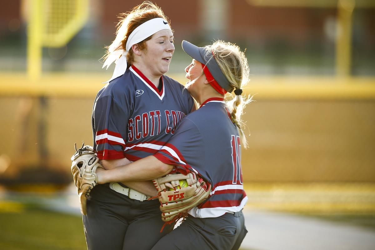 Scott County’s Ashley Adkins, left, celebrated with Carly Oliver after Adkins made a diving catch during their game against Boyle County. “We were so loaded that people didn’t get the opportunities that they would have gotten somewhere else maybe,” Oliver said, “but this year they’ve stepped up and I’m really proud of ’em.”