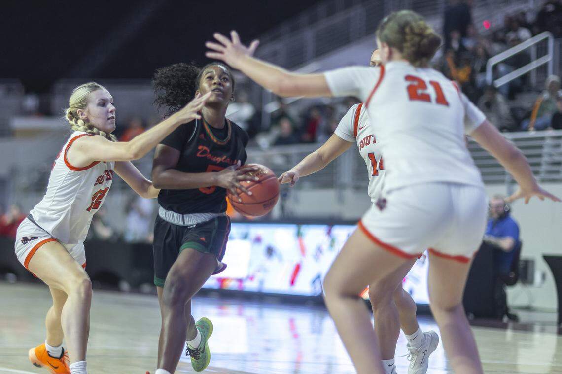 Frederick Douglass' Peighton Okorley drives the ball in a game against Madison Southern during the girls 11th Region Tournament semifinals at Eastern Kentucky University's Baptist Health Arena in Richmond, Ky., on Friday, March 6, 2026.