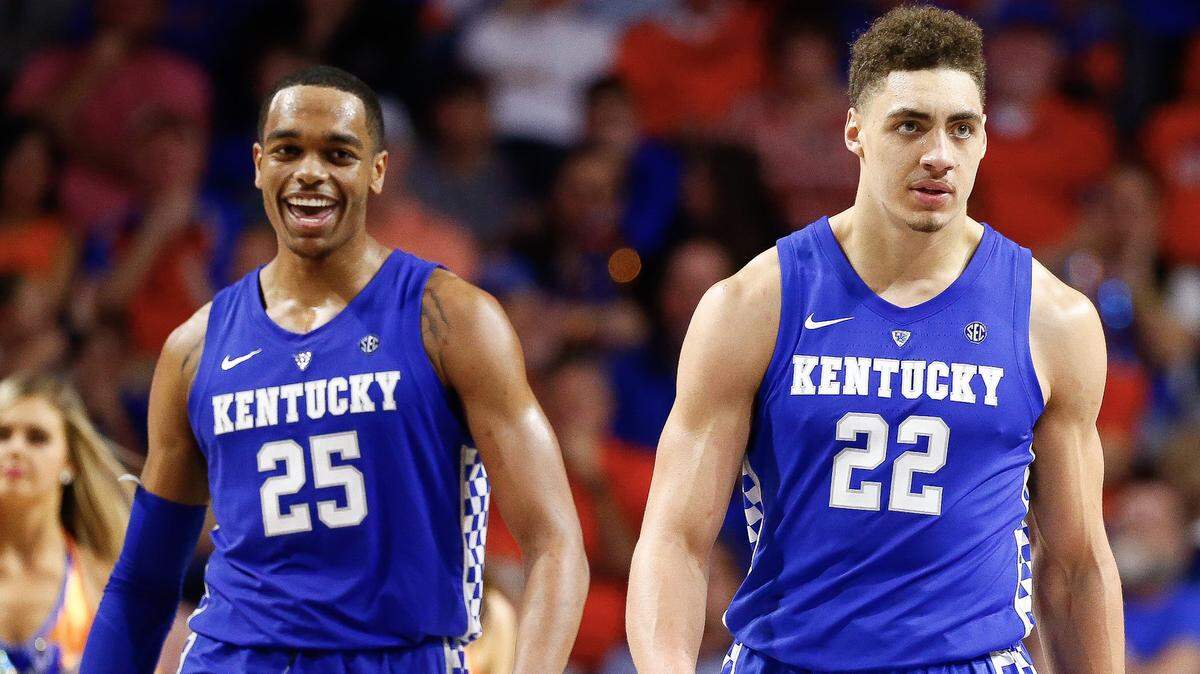 PJ Washington (25), Reid Travis and the Cats rallied in the second half to win at Florida.