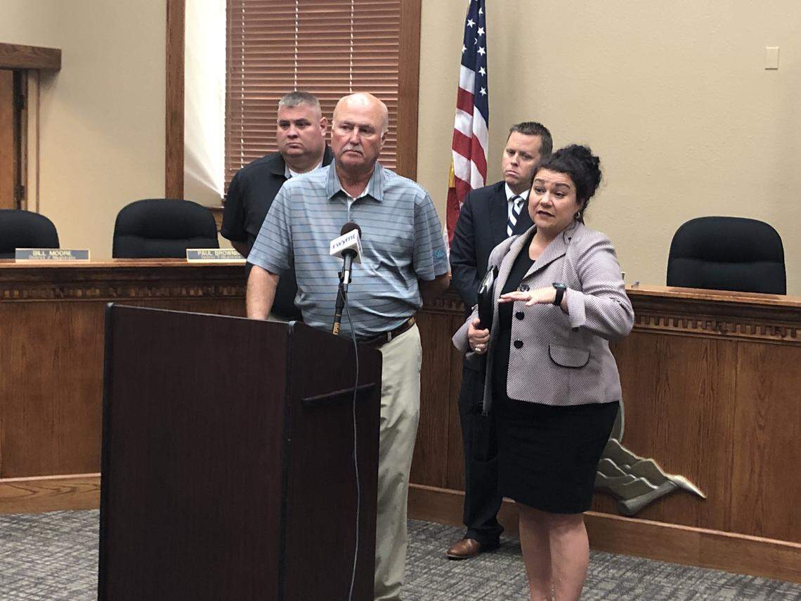 Sen. Johnny Ray Turner (D-Prestonsburg) and Rep. Angie Hatton (D-Whitesburg) discuss a bill aimed at closing a loophole that allowed a coal company to leave hundreds of miners with cold checks during its bankruptcy.