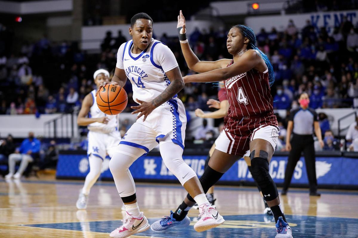 Kentucky’s Dre’una Edwards (44) operates against South Carolina’s Aliyah Boston (4) on Thursday night. Edwards was limited to six points and fouled out in 24 minutes.