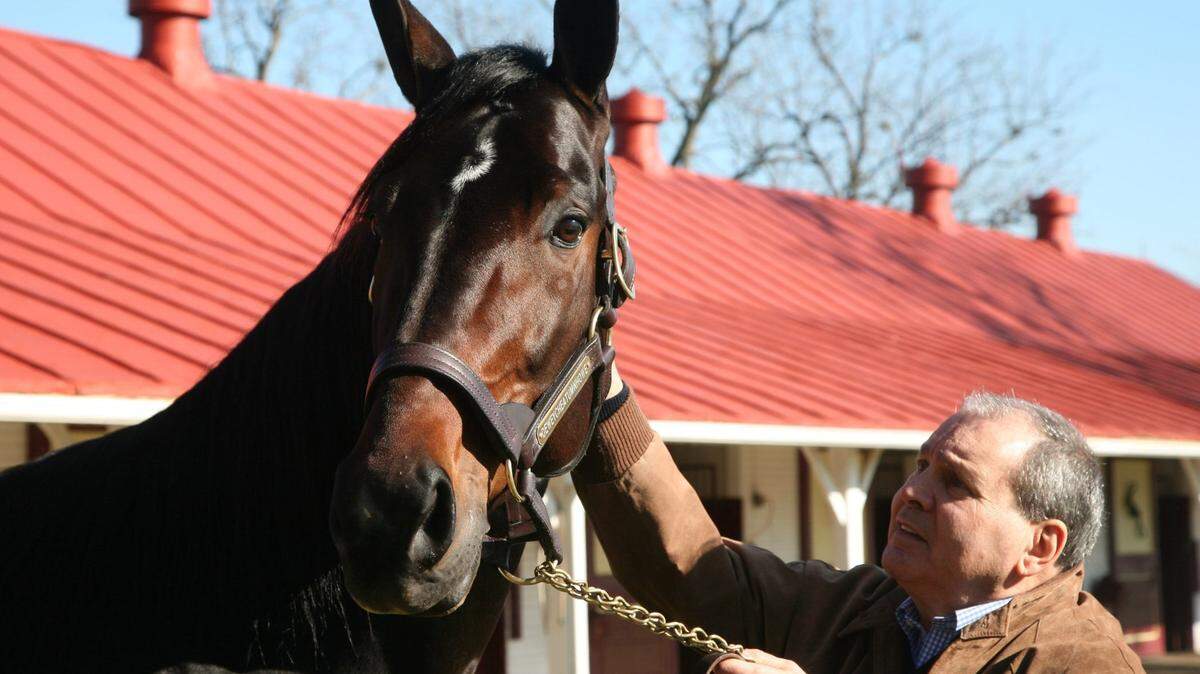 Alan Leavitt with Deweycheatumnhowe, the best trotting sire to ever stand in Kentucky, the highest priced sire in North America when he came here last year at Walnut Hall Ltd. in Lexington, Ky., Tuesday, Dec. 29, 2009. The horse is leaving for Ontario because there is no prospect of slots here to shore up harness racing. Pablo Alcala | Staff.