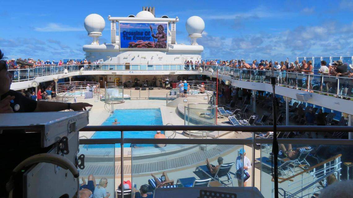 A crowd gathered on the Coral Princess on March 28 as the ship crossed the equator. Before Tuesday, the passengers who were stuck on the ship after being turned away at Buenos Aires were given free run of the ship. After an unusually high number of passengers started presenting flu-like symptoms, people were confined to their rooms.
