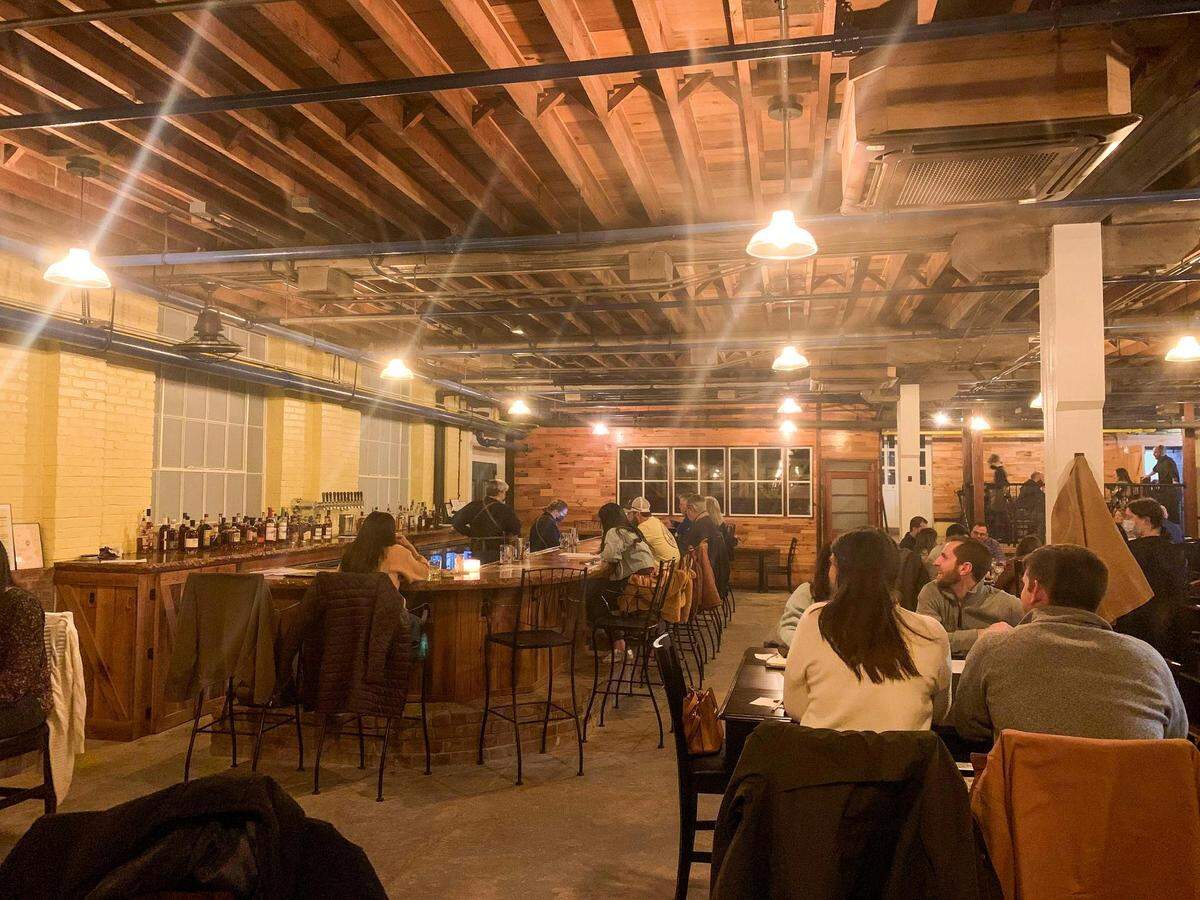 The bar at Honeysuckle, the new restaurant in Berea in the former Churchill Weavers loom house.