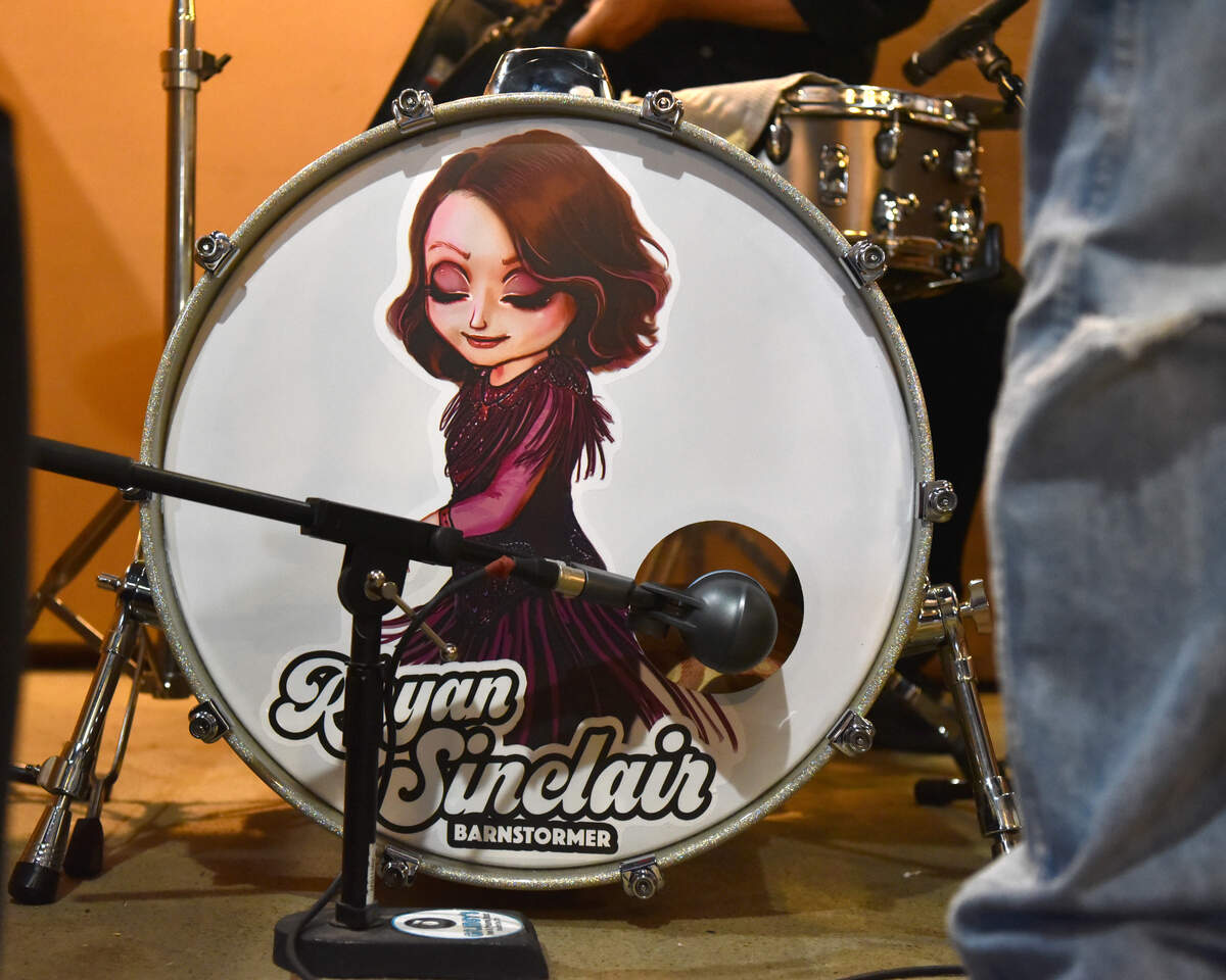 Drummer David Grigsby's kit sports an illustration of Rhyan  Sinclair by 17-year old Emma Guinnip of Lexington.