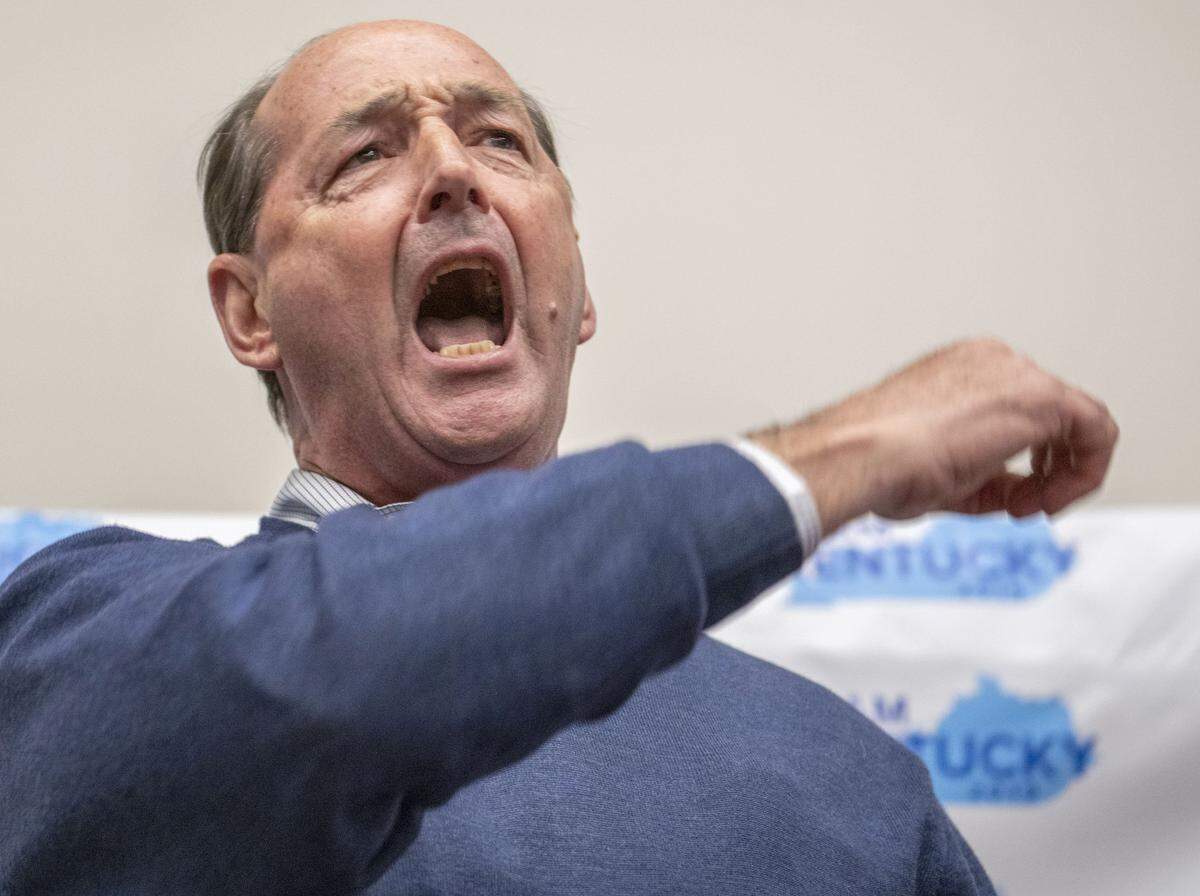 Kentucky House Minority Leader Rocky Adkins fired up a crowd during a campaign stop with Democratic gubernatorial candidate Andy Beshear Saturday, Nov. 2, 2019, during a campaign stop at the Fuzzy Duck Coffee shop in Morehead, Ky.