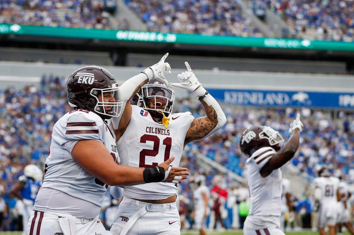 Eastern Kentucky running back Braedon Sloan (21) celebrates scoring a touchdown against Kentucky during Saturday’s game at Kroger Field.