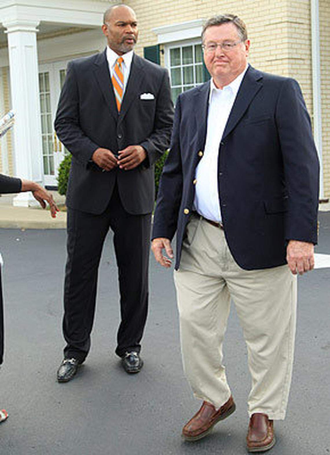 Former University of Kentucky head basketball coach Joe B. Hall, right, and player Winston Bennett talked to the media after the visitation for ex-Wildcat Melvin Turpin in 2010 at Kerr Brothers Funeral Home in Lexington. Turpin died at age 49 from an apparent suicide.