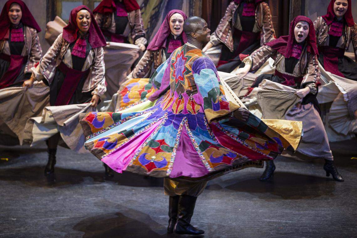 Darien Sanders, center, dances during a rehearsal of Joseph and The Amazing Technicolor Dreamcoat on Monday, July 28, 2025, at the Lexington Opera House in Lexington, Ky.