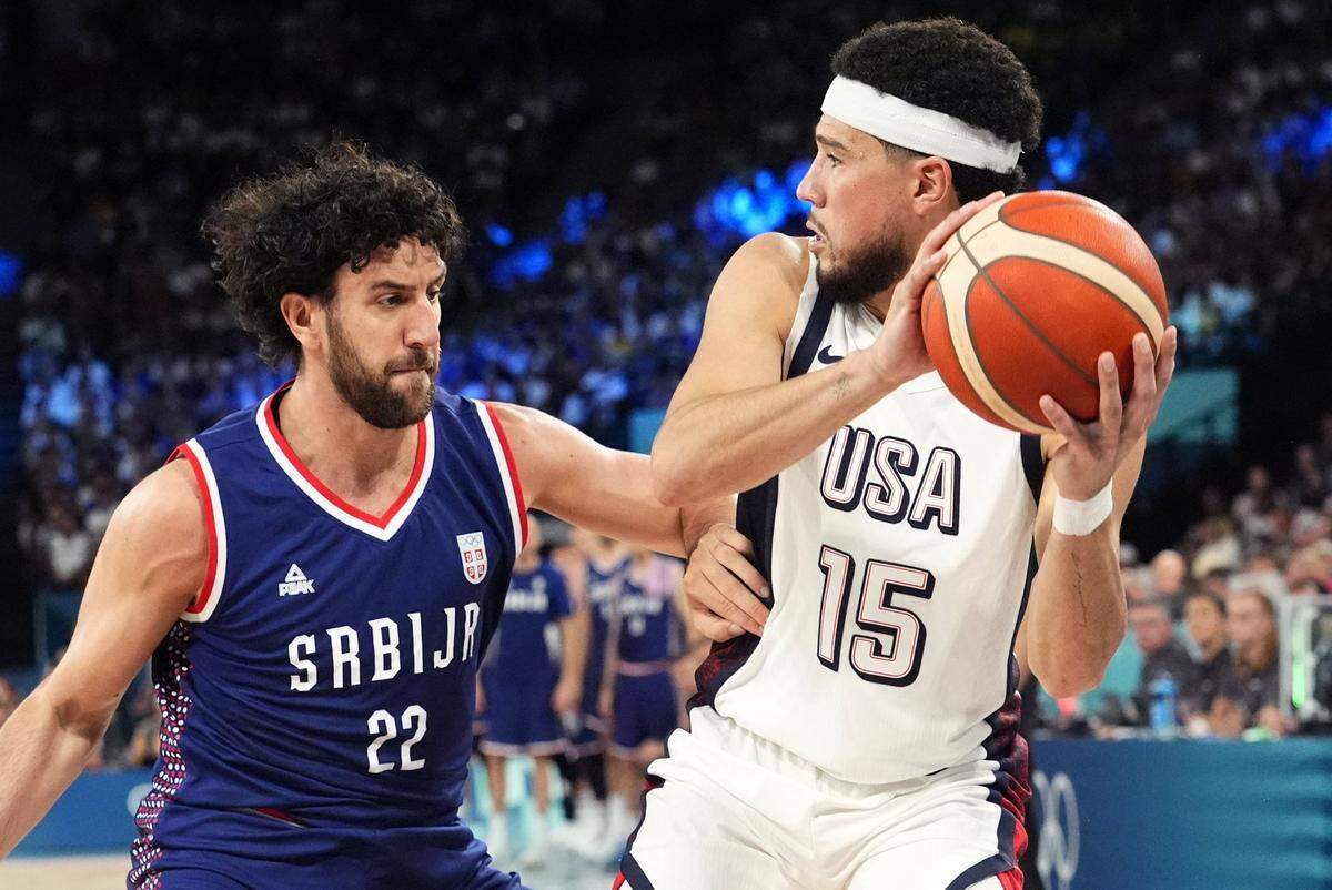 Team USA coach Steve Kerr said former Kentucky guard Devin Booker (15) “was the unsung MVP” for the Olympics gold-medal winning American men’s basketball team in Paris. Booker, now 27, will be 31 when the 2028 Los Angeles Olympics commence. He could be part of a “Big Blue” invasion of basketball rosters at the L.A. Olympics.
