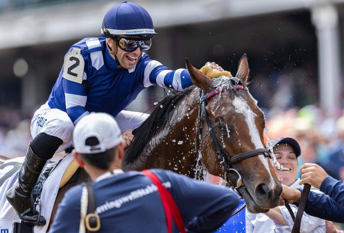 Jockey Umberto Rispoli celebrated after guiding Trikari to victory in the American Turf at Churchill Downs on Kentucky Derby Day, 2024, In the 2025 Kentucky Derby, Rispoli has the mount on race favorite Journalism.