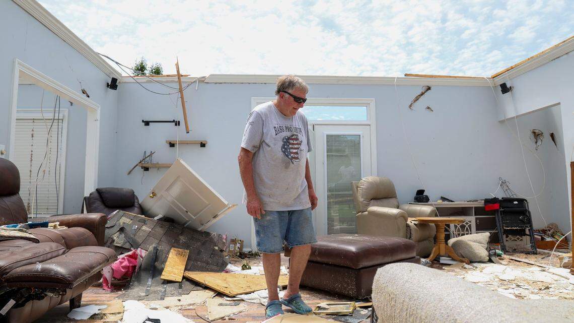 Lacy Castle surveyed the damage to his home on Cedar Ridge Drive in the Crooked Creek neighborhood east of London, Ky., Sunday, May 18, 2025. Two days earlier, thunderstorms and a deadly tornado ripped through the Laurel County, destroying many homes, including Castle’s, who survived the storm in his house along with his wife. Castle said storm took the roof in one piece, “boom and you could look at the sky.” Their roof landed scattered across the street he said.