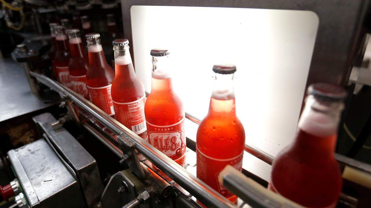 Bottles of Cherry Ale-8-One stream along the production line at the Ale-8-One bottling facility in Winchester.