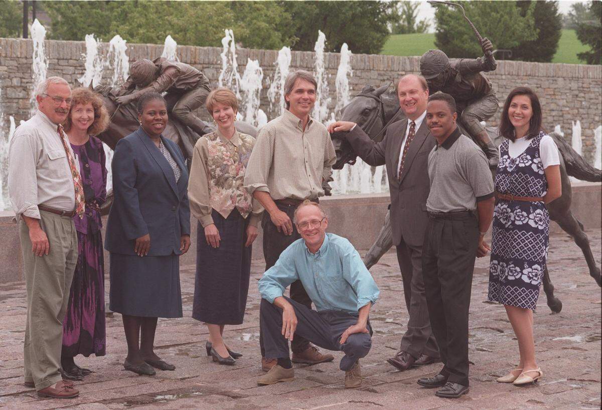 The Lexington Herald-Leader editorial board taken Sept. 9, l997 in Thoroughbred Park: Larry Keeling; Jamie Lucke; Vanessa Gallman; Pam Luecke; Bill Bishop; Joel Pett (kneeling); Tim Kelly; Bob Campbell; Audrey Lee.
