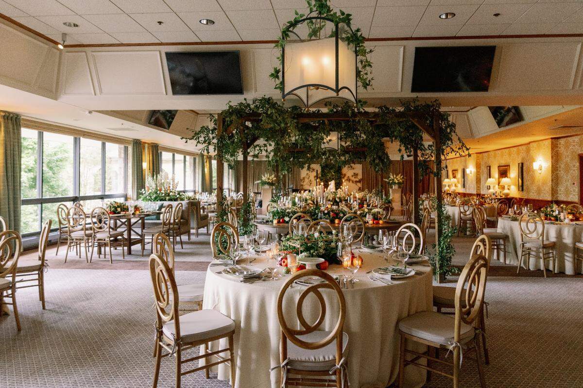 The dining area of the Keeneland Clubhouse can be transformed into a wedding venue space, overlooking the saddling paddock.