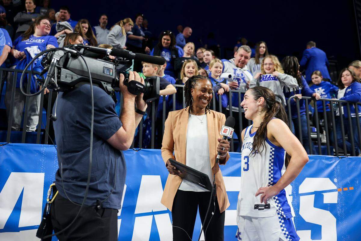 Kentucky’s Georgia Amoore, right, is interviewed after she scored 34 points in the Wildcats’ NCAA Tournament victory against Liberty on Friday, March 21, 2025, at Memorial Coliseum in Lexington, Ky.